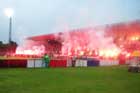 The covered stand in flames